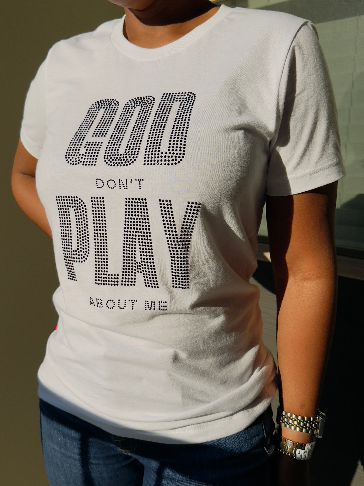 “God Don’t Play About Me” Rhinestone T-Shirt – Sparkle with Faith and Style